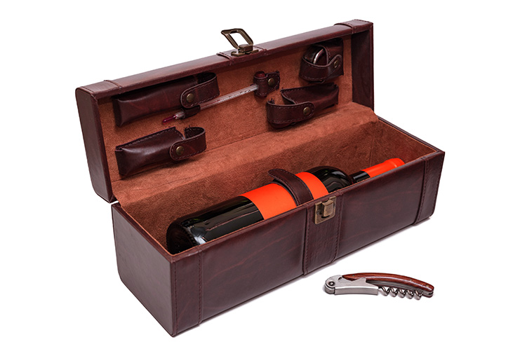 Wine bottle carrying case with wine opener.