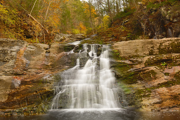 Waterfall at Kent Falls State Park durning autumn.