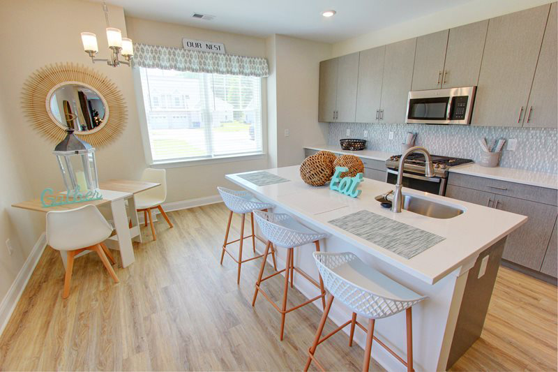 Beautiful spacious modern kitchen with Island and bar stools.